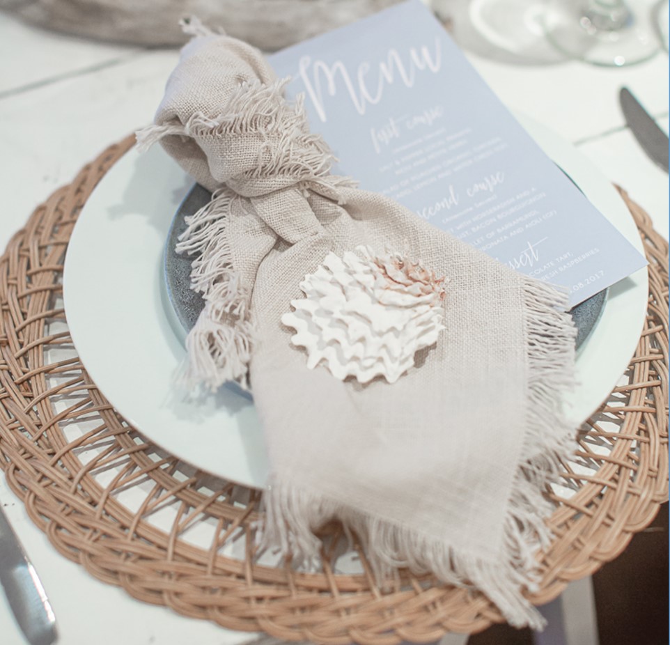 Natural woven charge and cream napkin