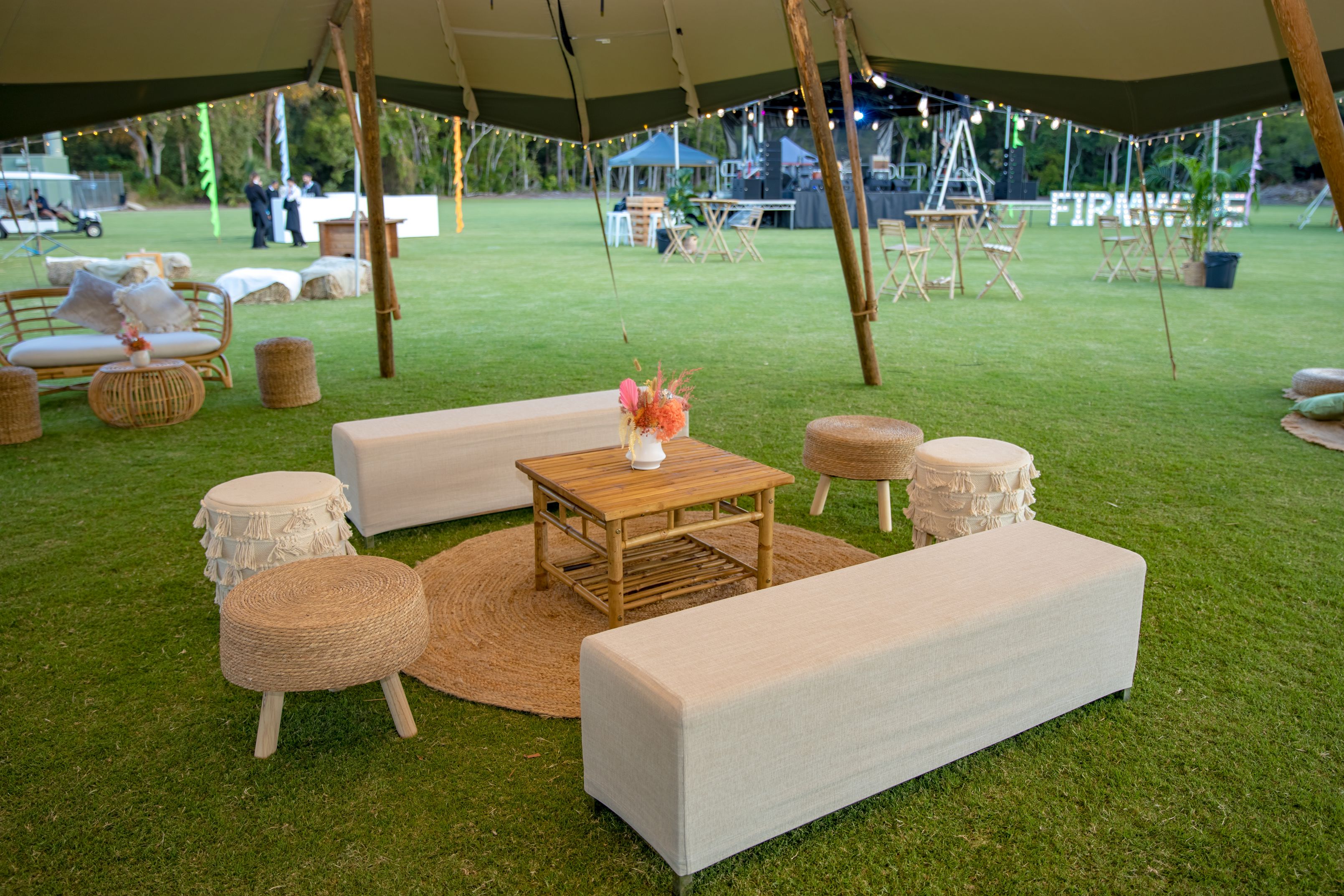 natural blanco benches, ottomans square coffee table and round rug