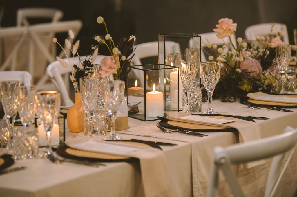 Black lanterns pair, jute chargers and crystal glassware