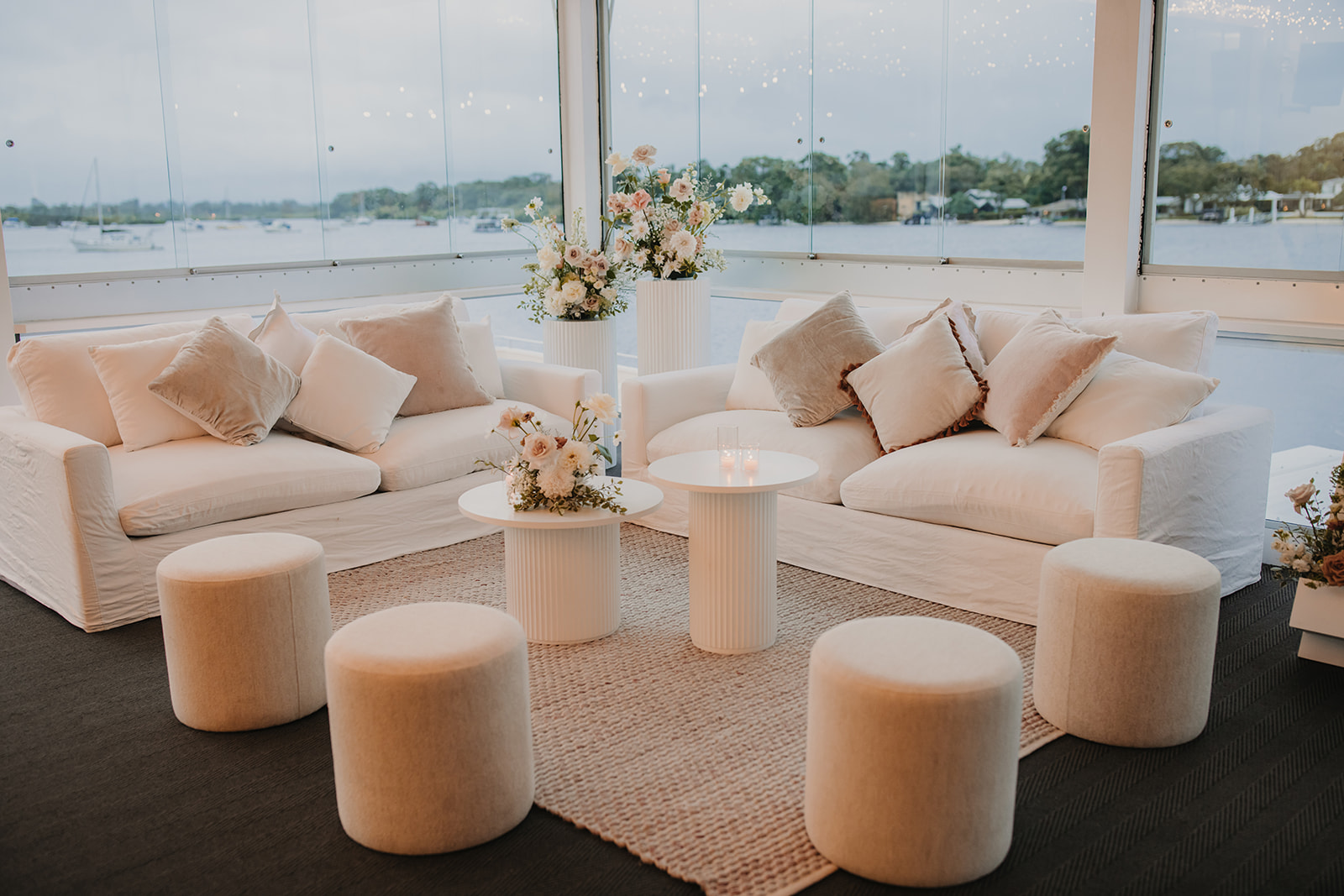 White Linen Lounge with ottomans, ribbed coffee table