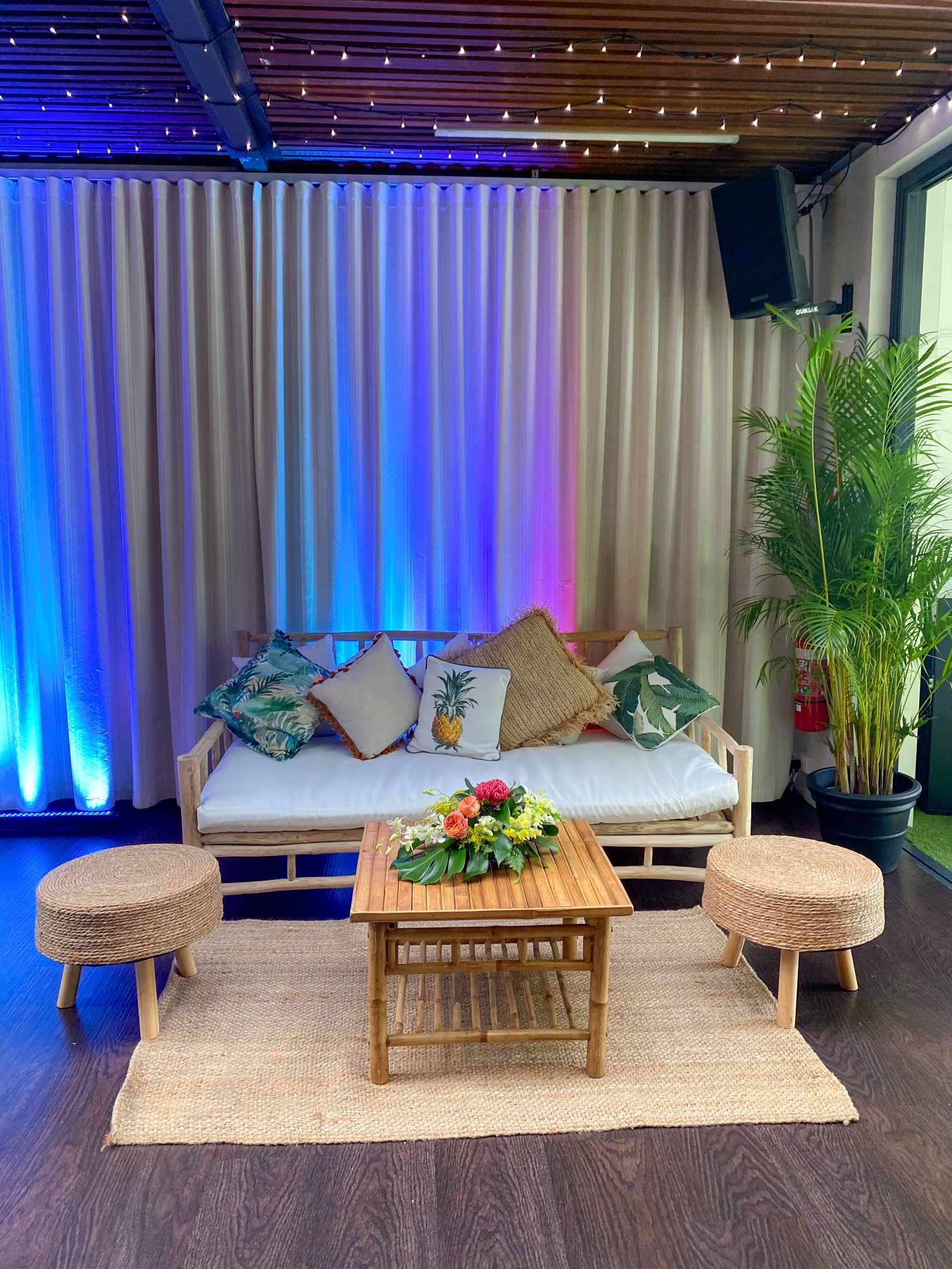 Driftwood day bed seeting with bamboo coffee table, seagrass rug and stools