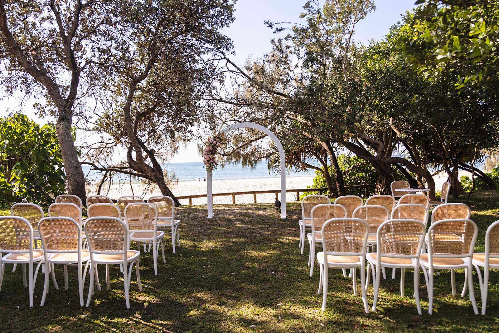 White rattan bentwood and arched arbour ceremony