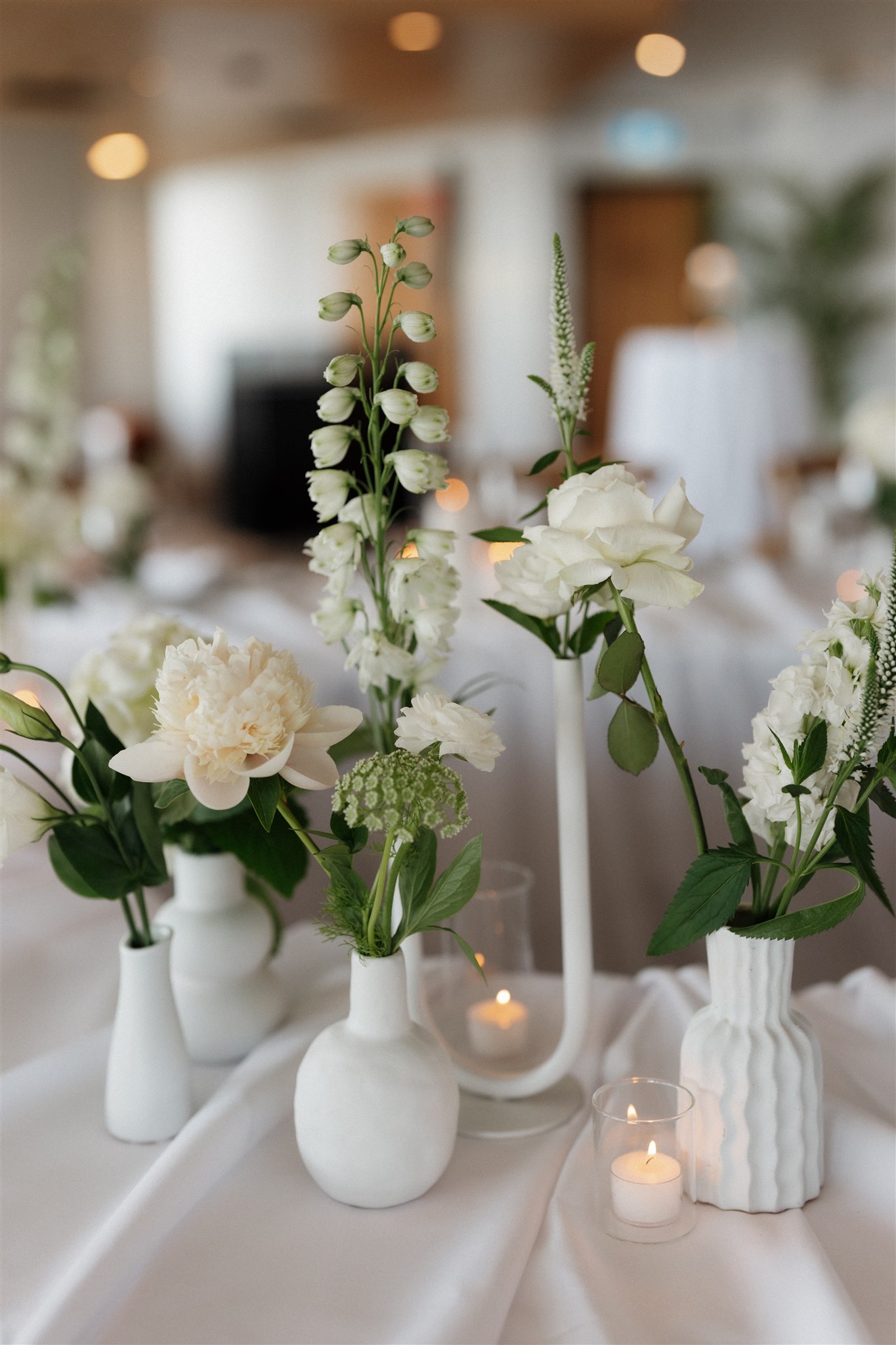 u shape vase and white vases