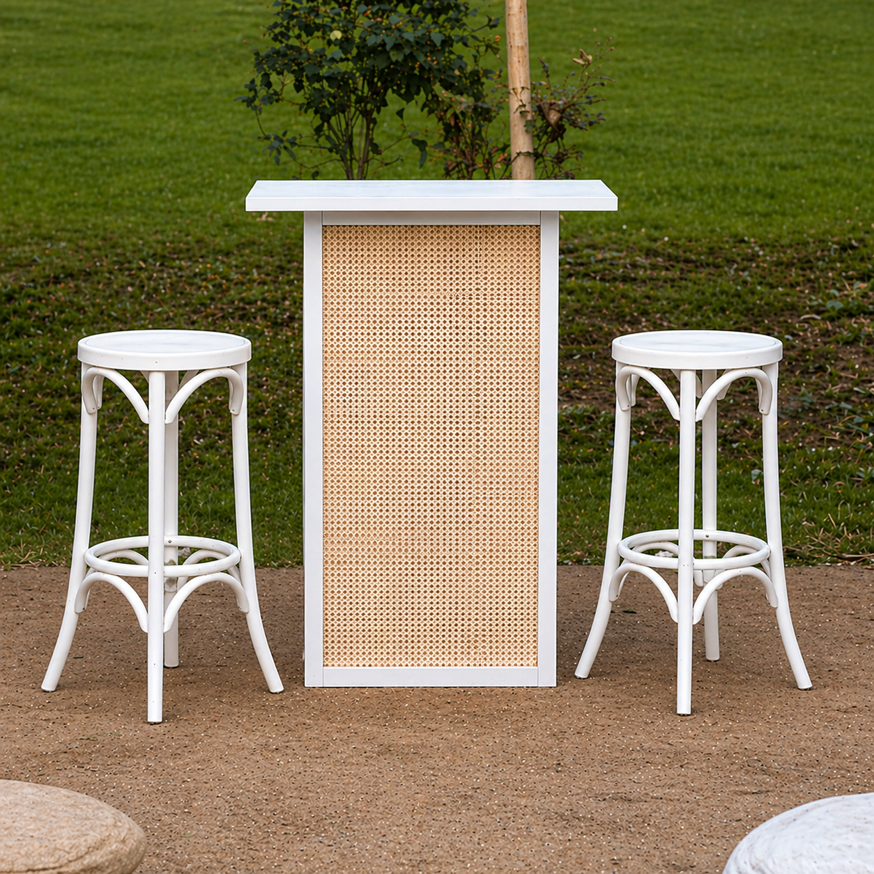 White rattan bar and white bentwood stools