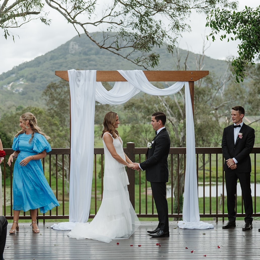Hire Timber frame arbour with chiffon swag 