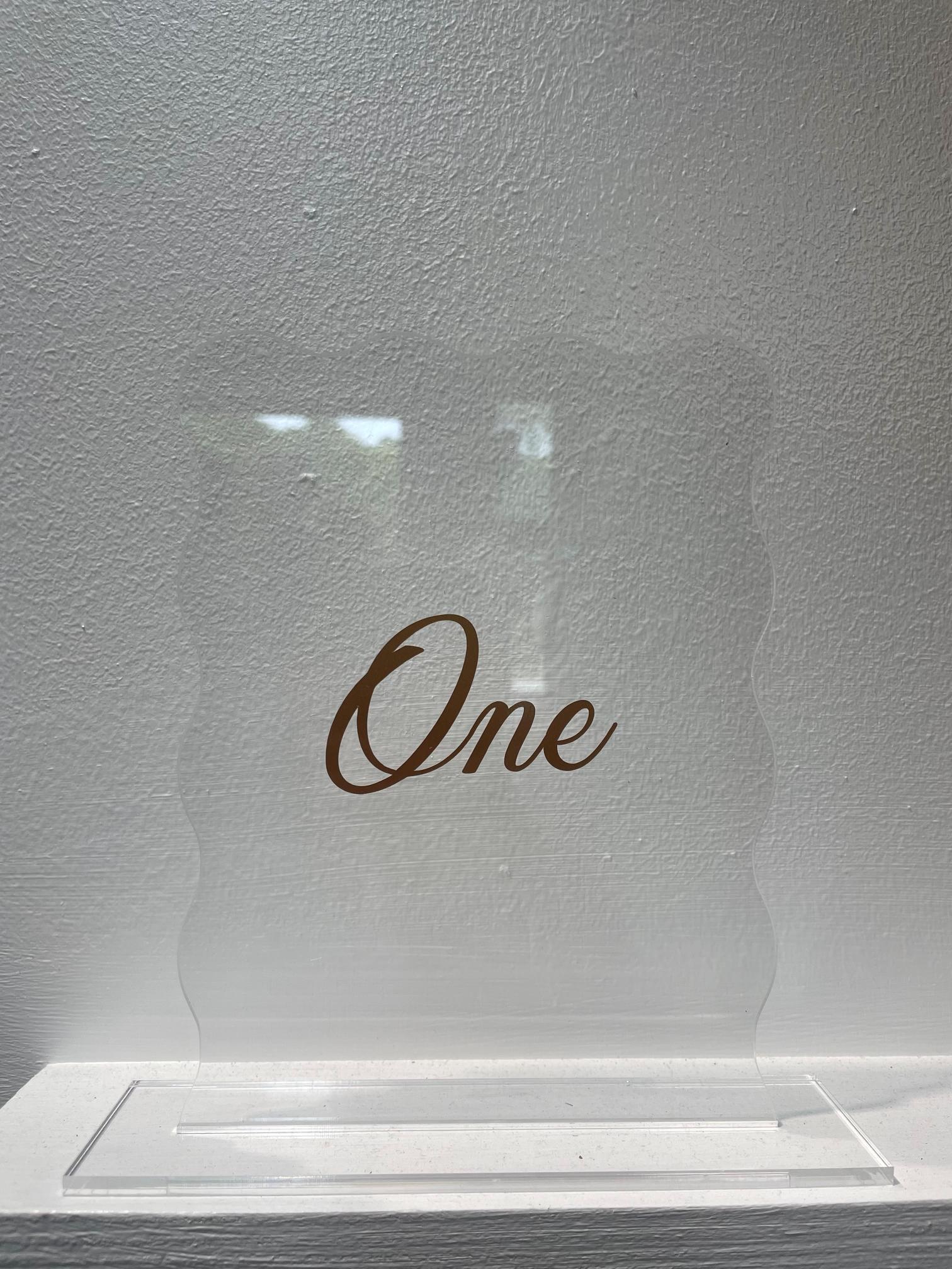 Hire Acrylic wavy table numbers 