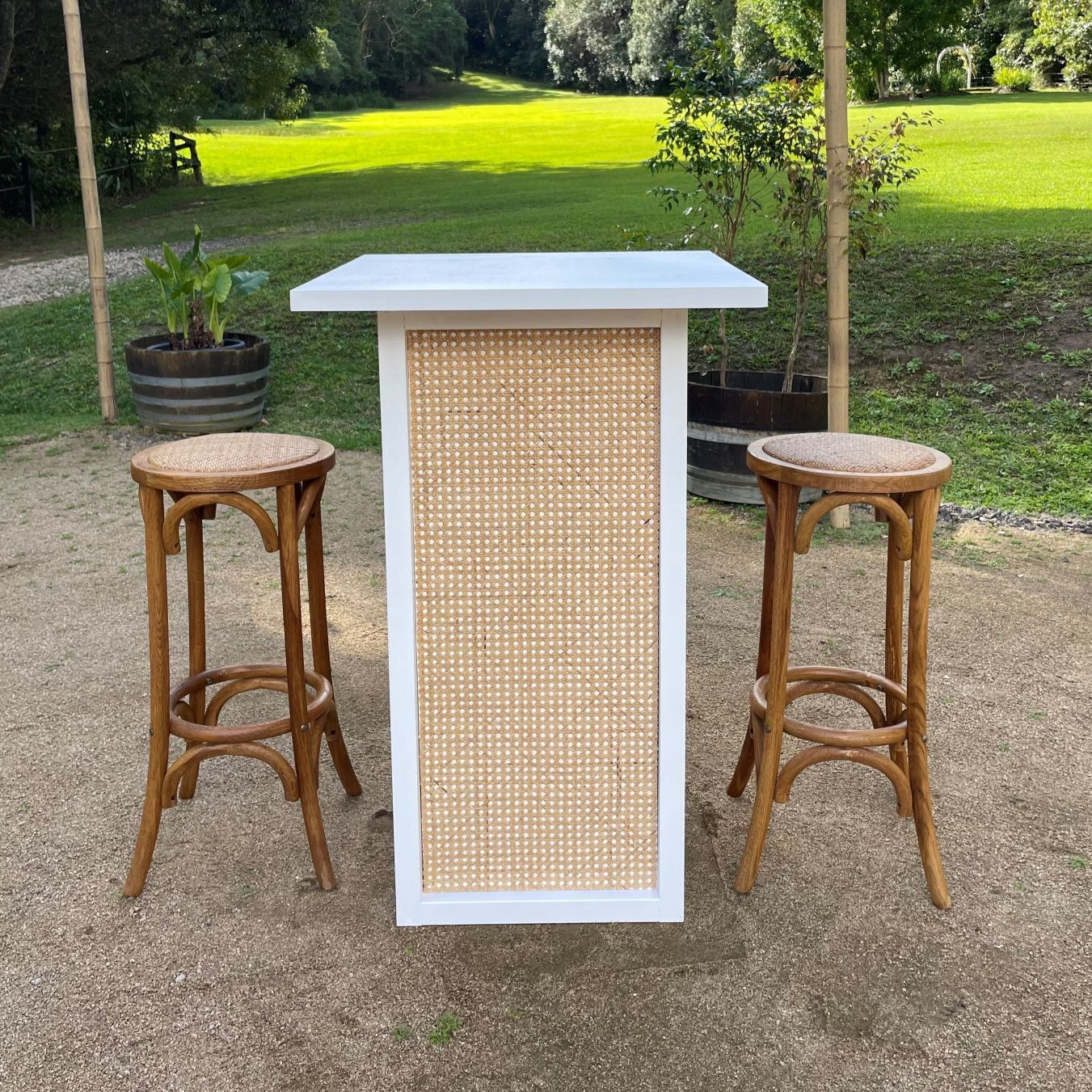 Hire White rattan high bar 